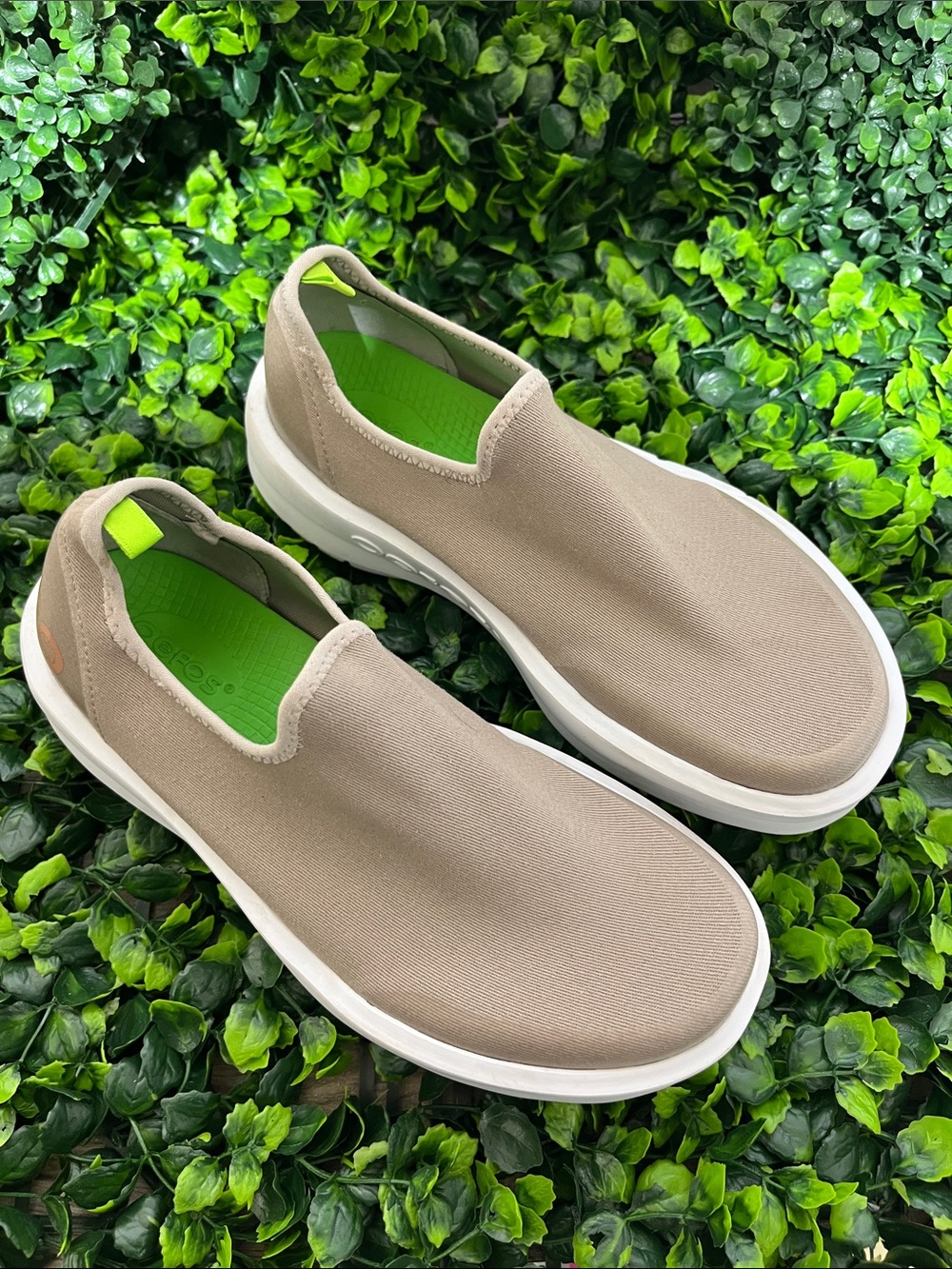 OOFOS Women's Slip-On Sneakers in Taupe with Bright Green Insole